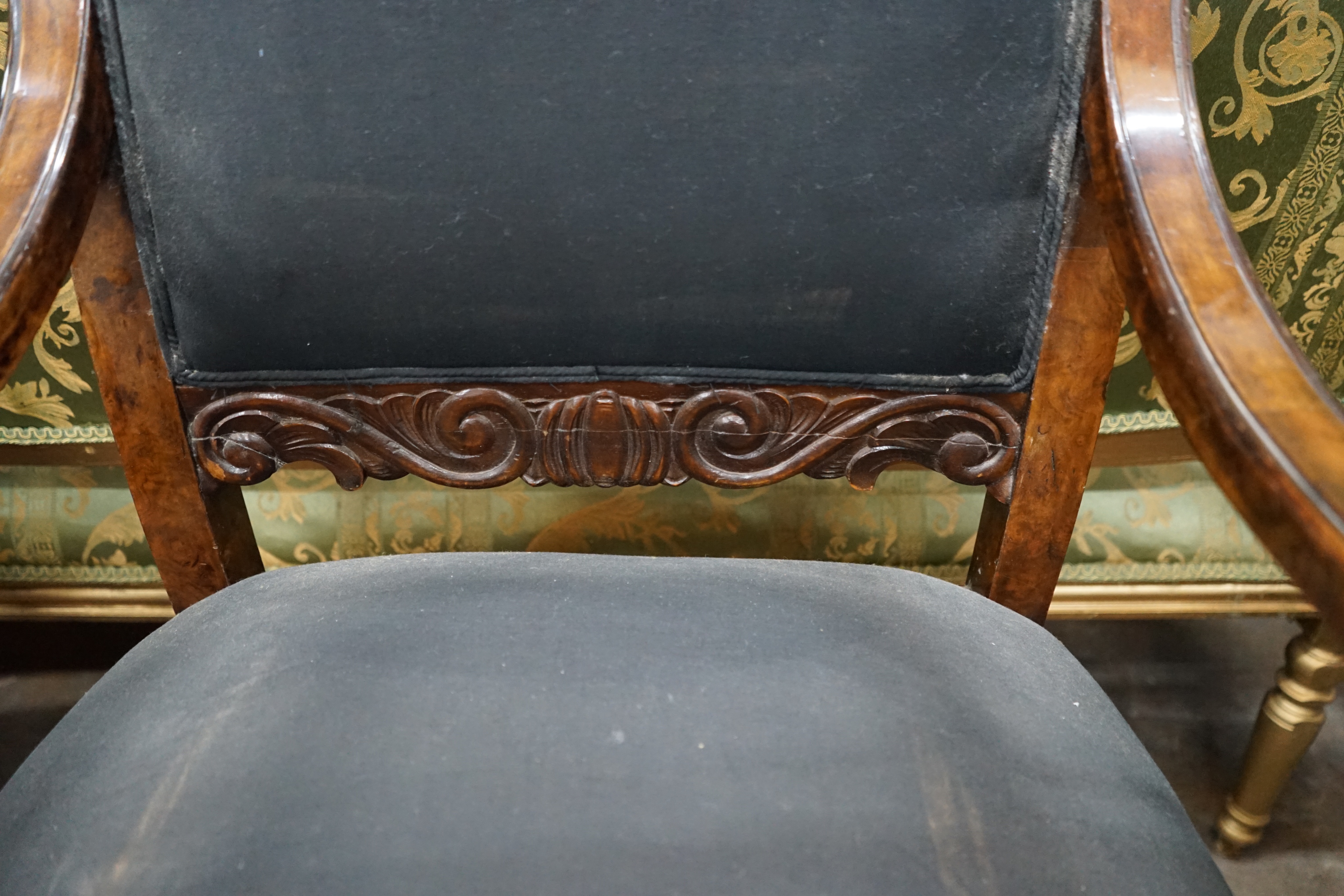 A pair of George II style burr walnut elbow chairs, on lions paw feet, width 58cm, depth 70cm, height 112cm